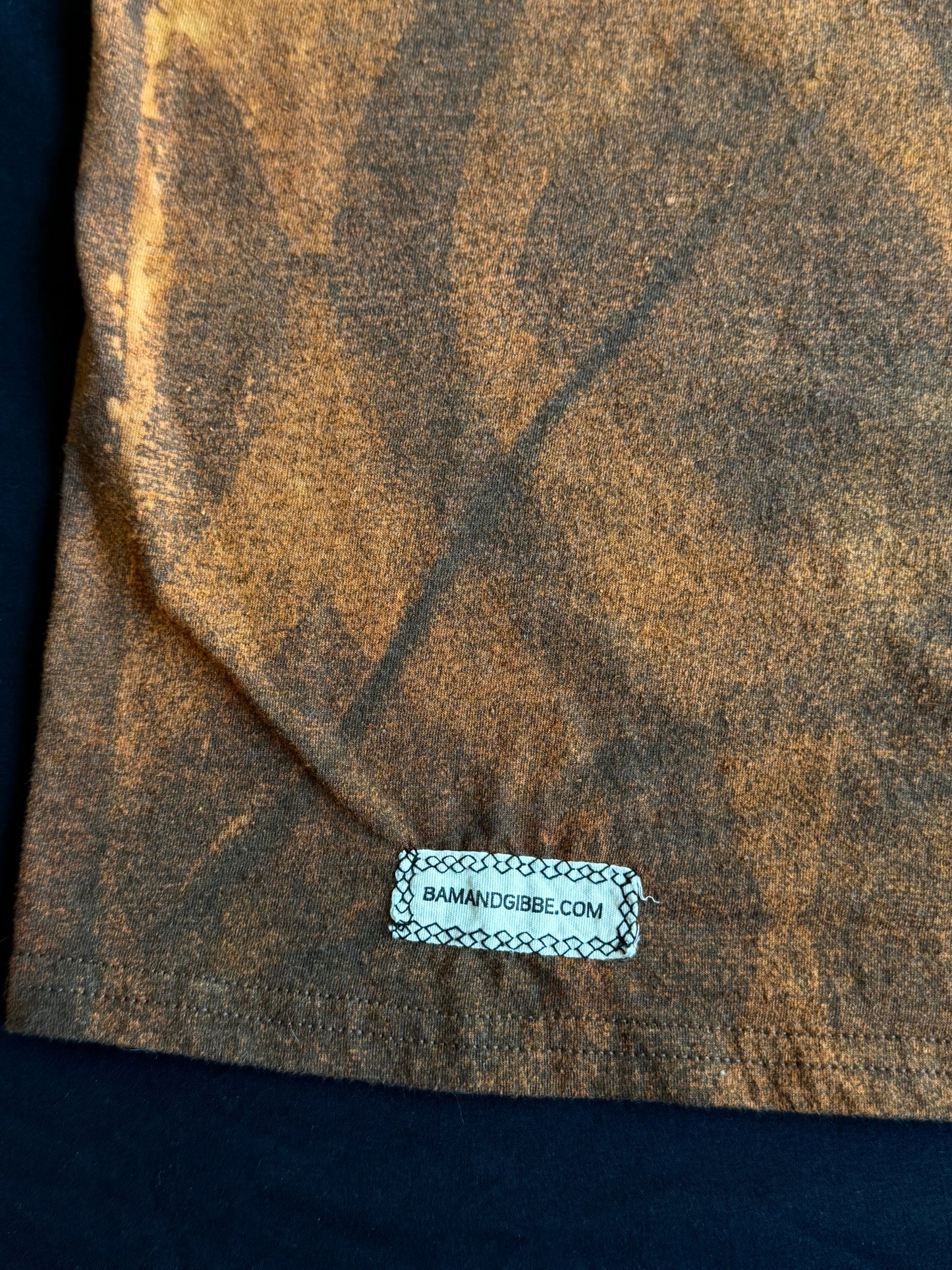 Intertwined patch bleach dyed t-shirt