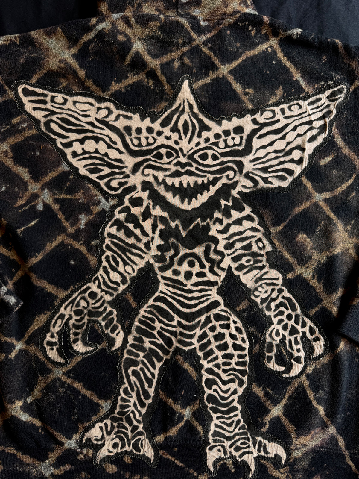 Gremlin + chameleon bleach dyed hoodie