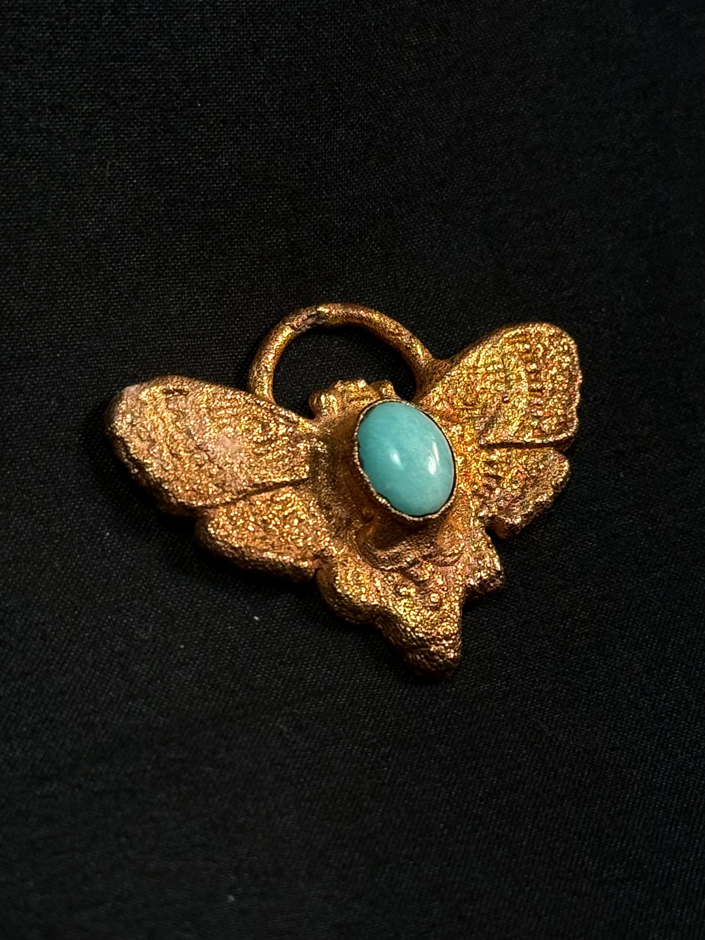 Aquamarine moth amulet