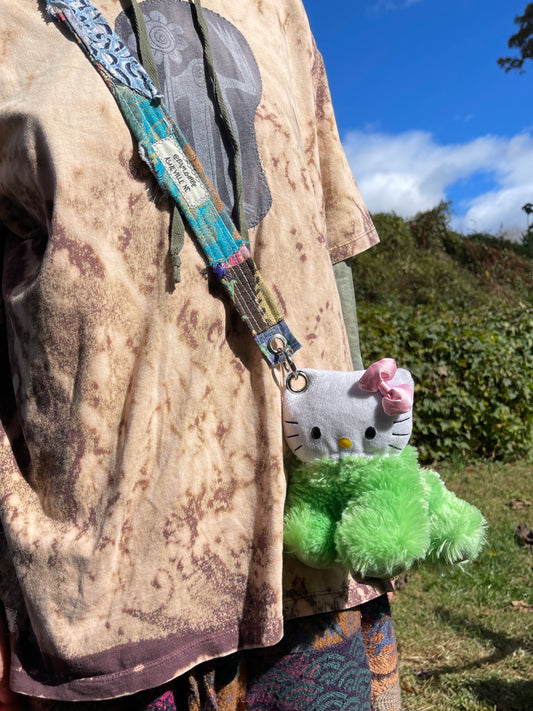 Hello Kitty + fuzzy green hybrid mini side bag