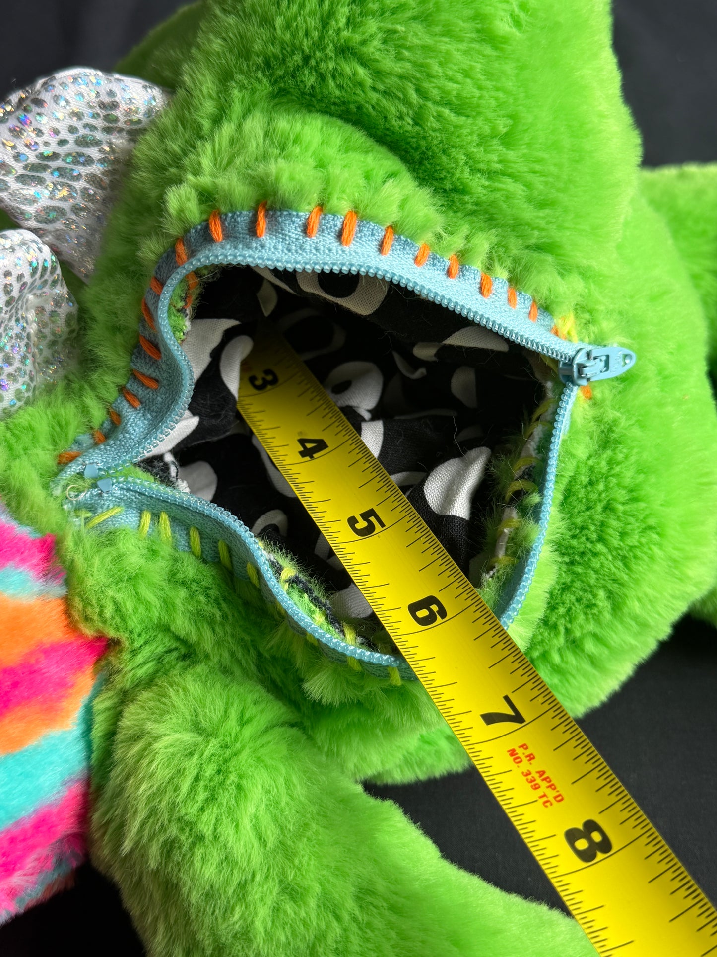 Colorful cat + dino hybrid side bag