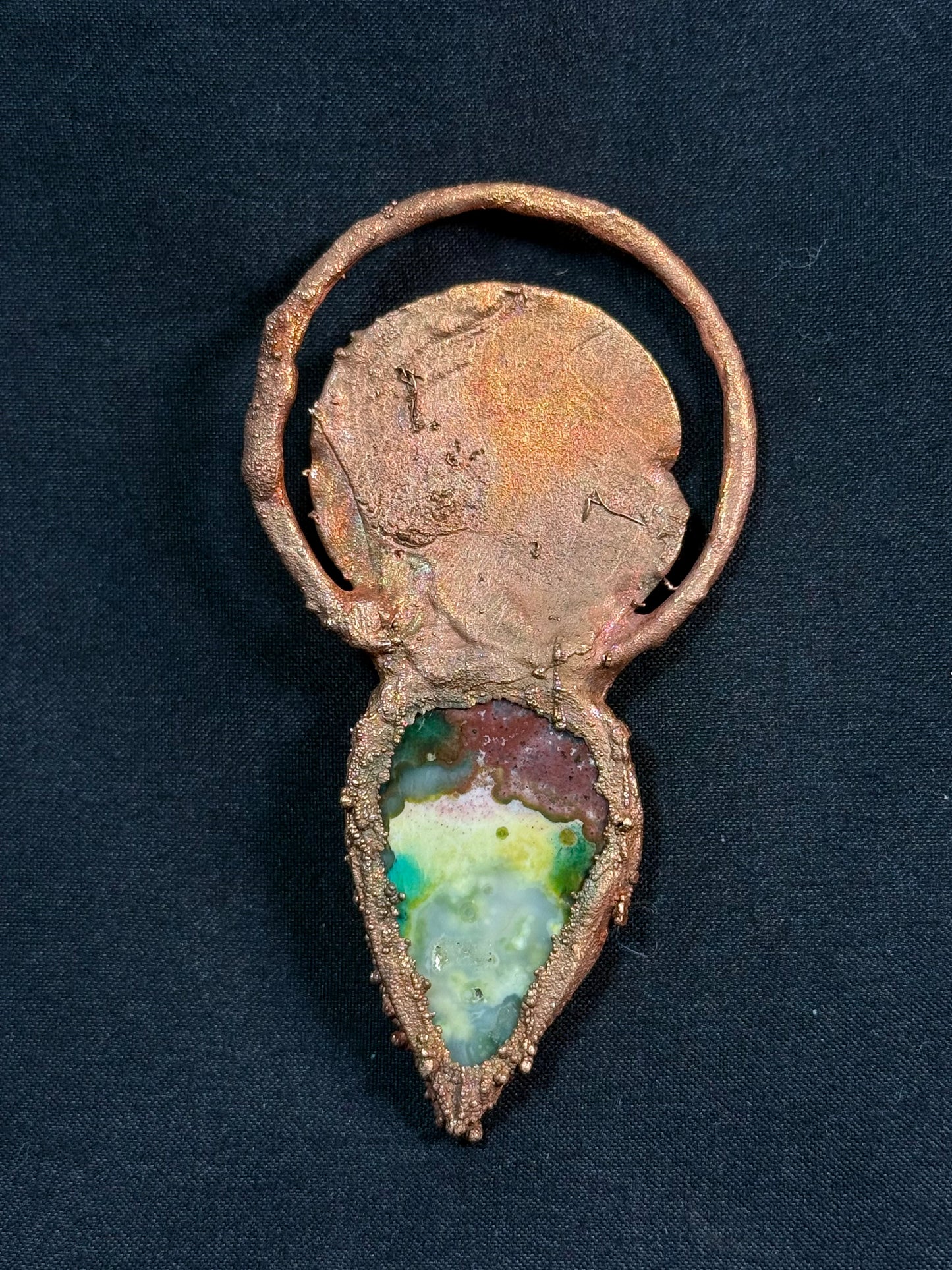 The sun and moon agate amulet