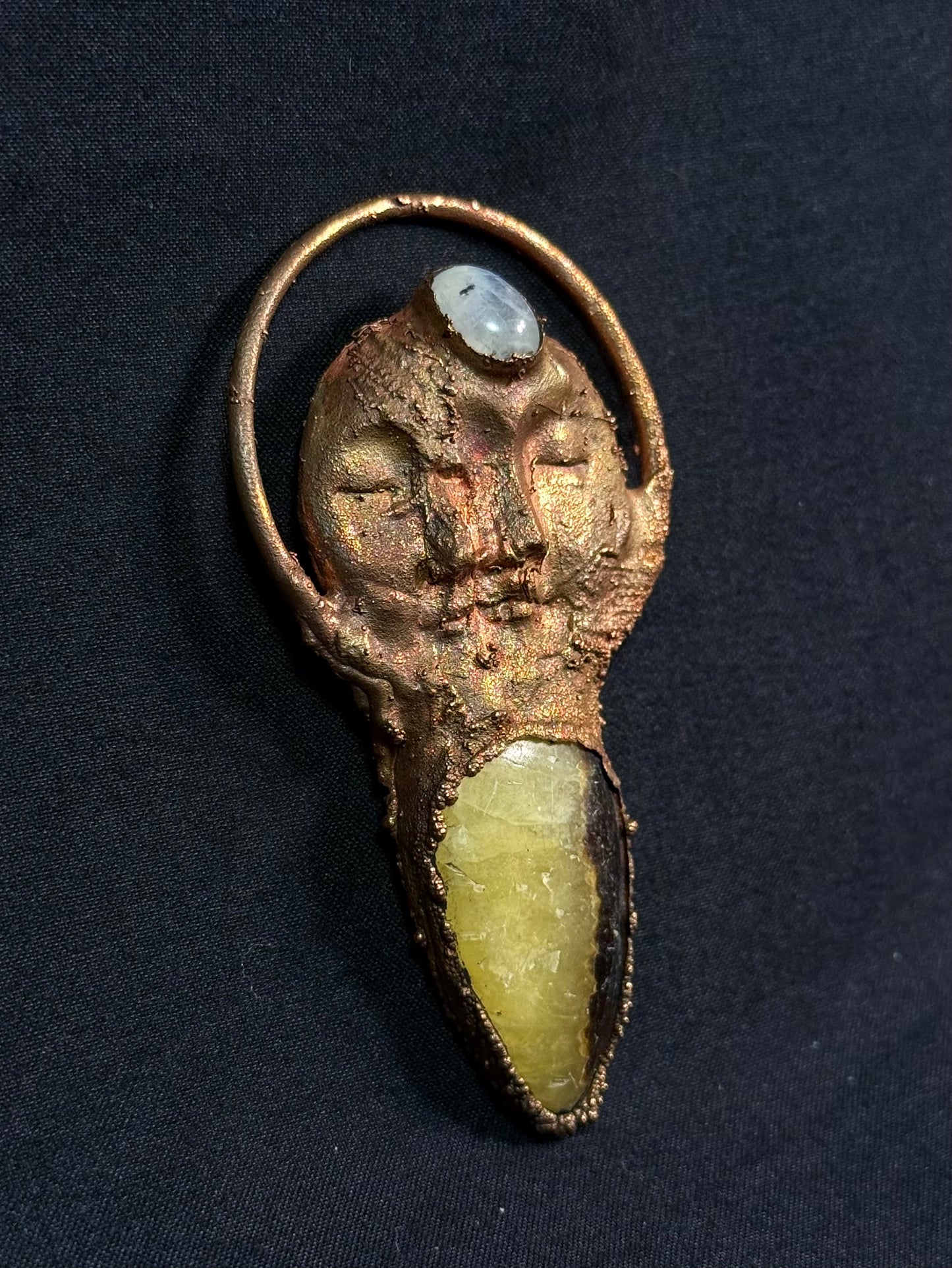 The sun and moonstone amulet