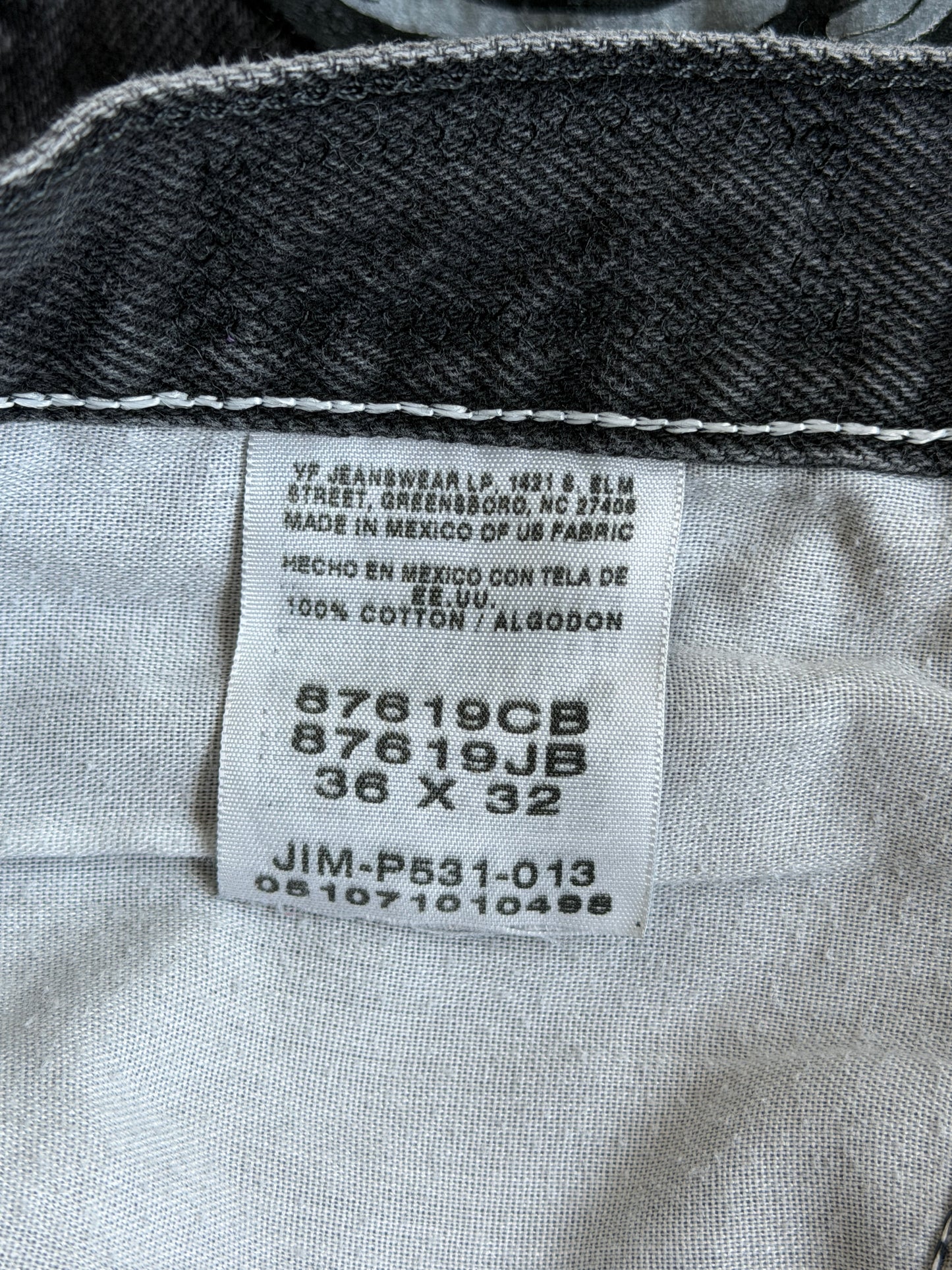Black and white patch black jean shorts