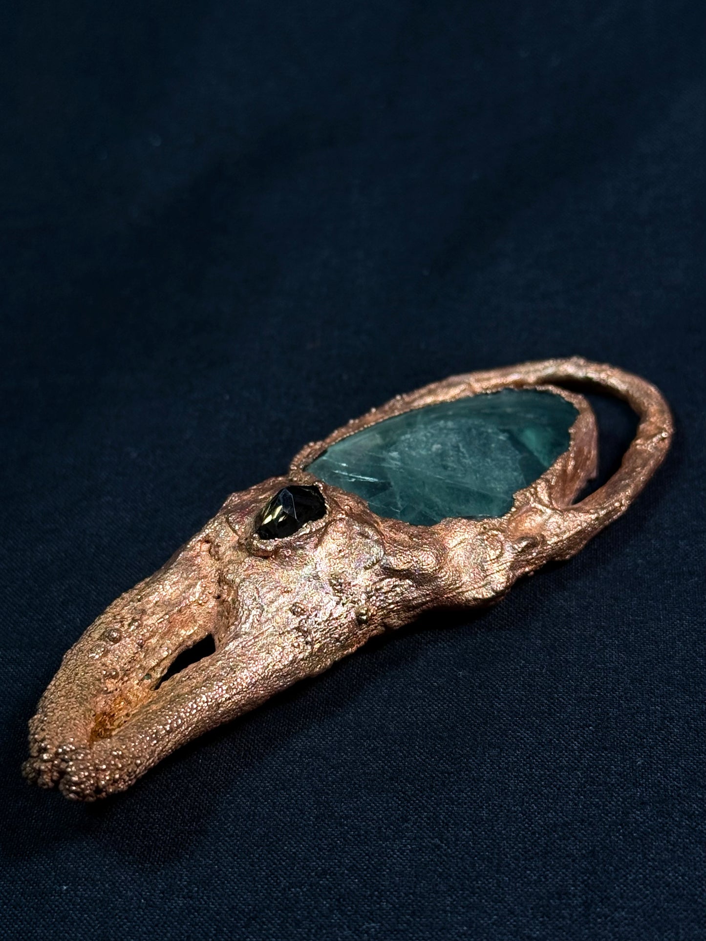 Fluorite crab claw amulet