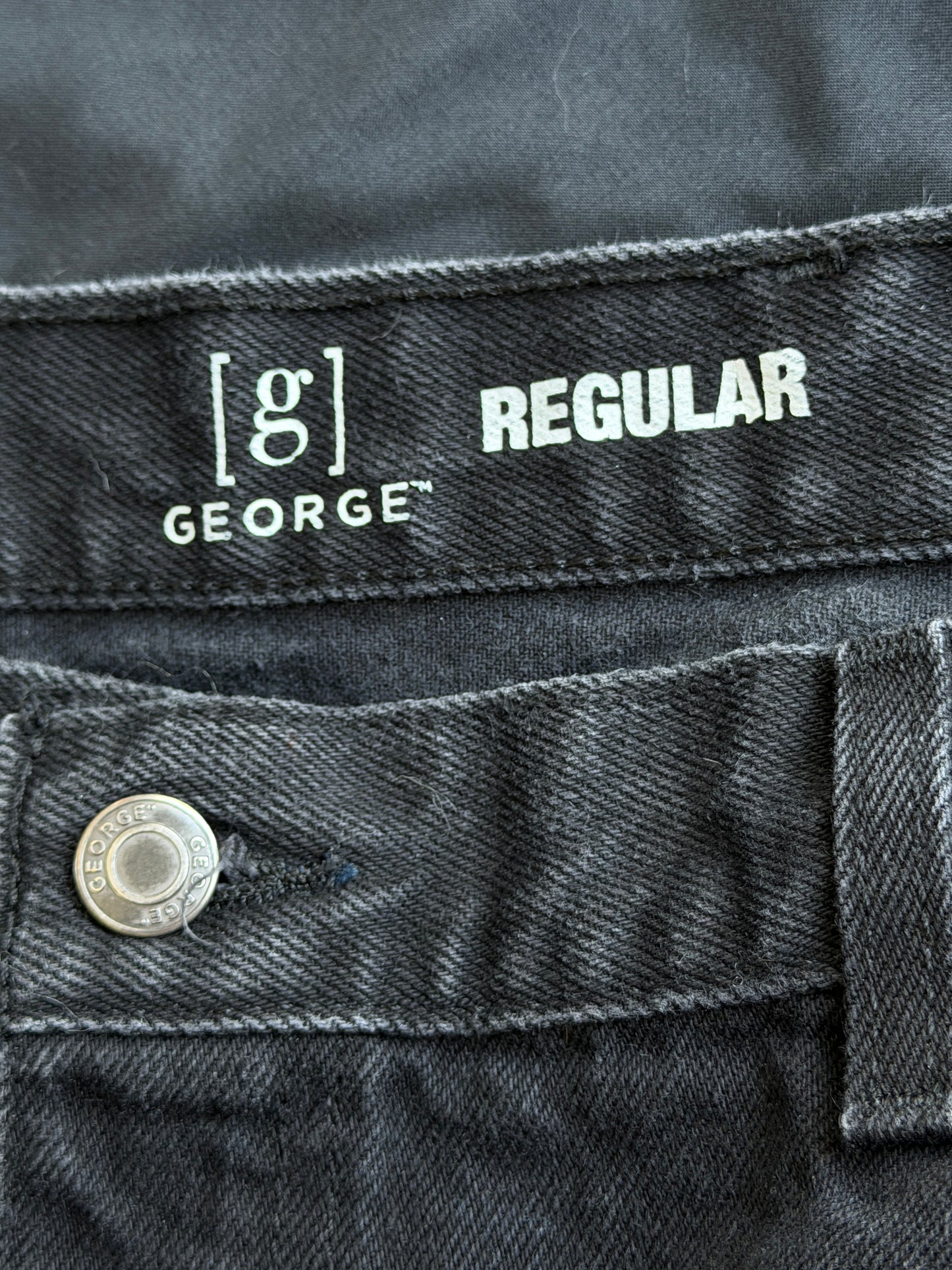 Black and white patch black jean shorts