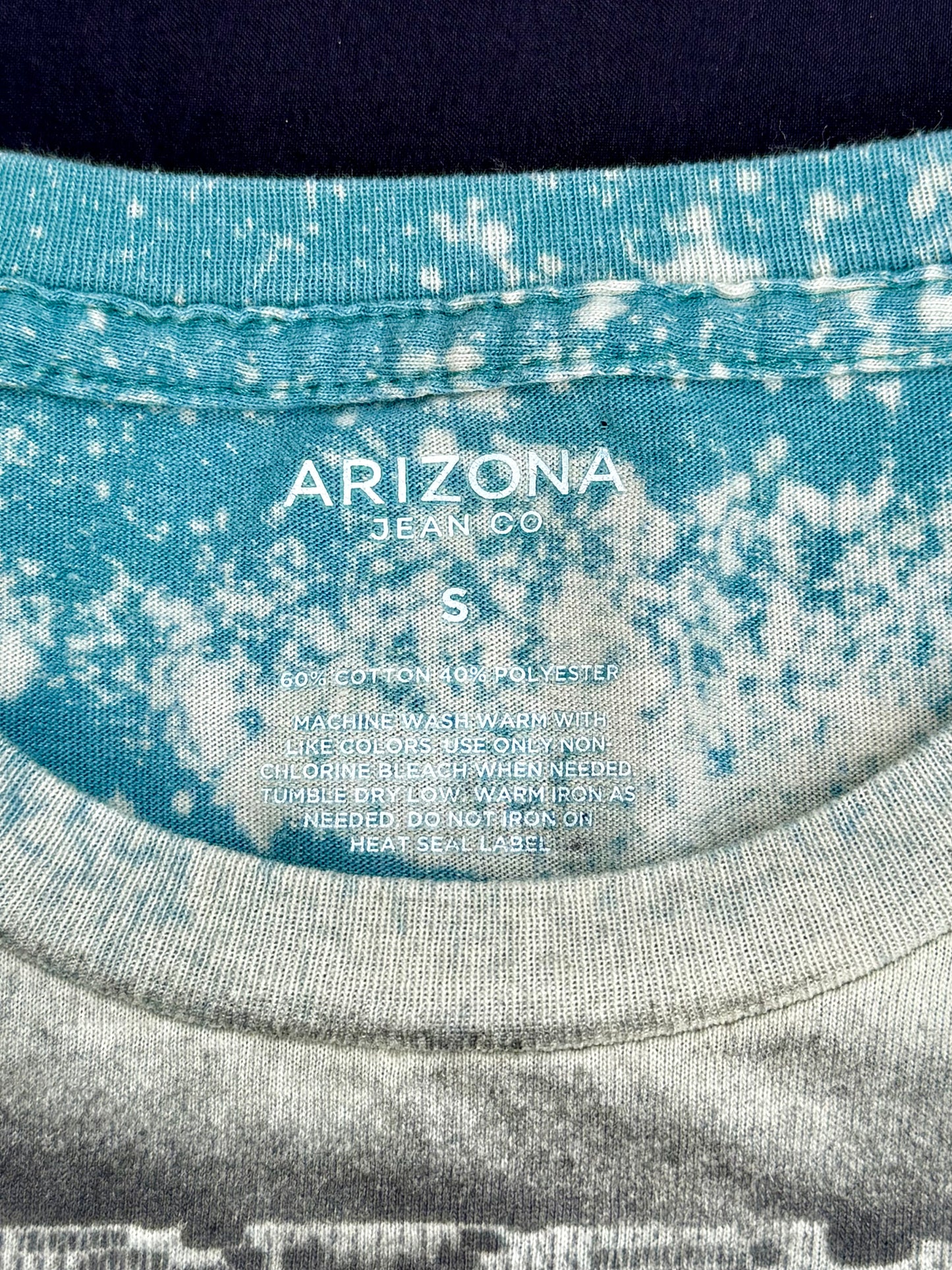 Tipper bleach dyed and spray painted t-shirt