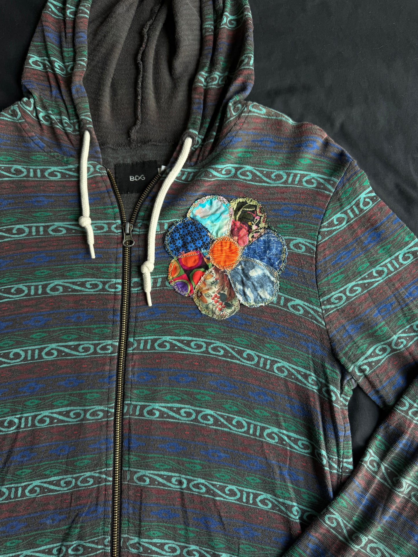 Scrappy clown flower zip up