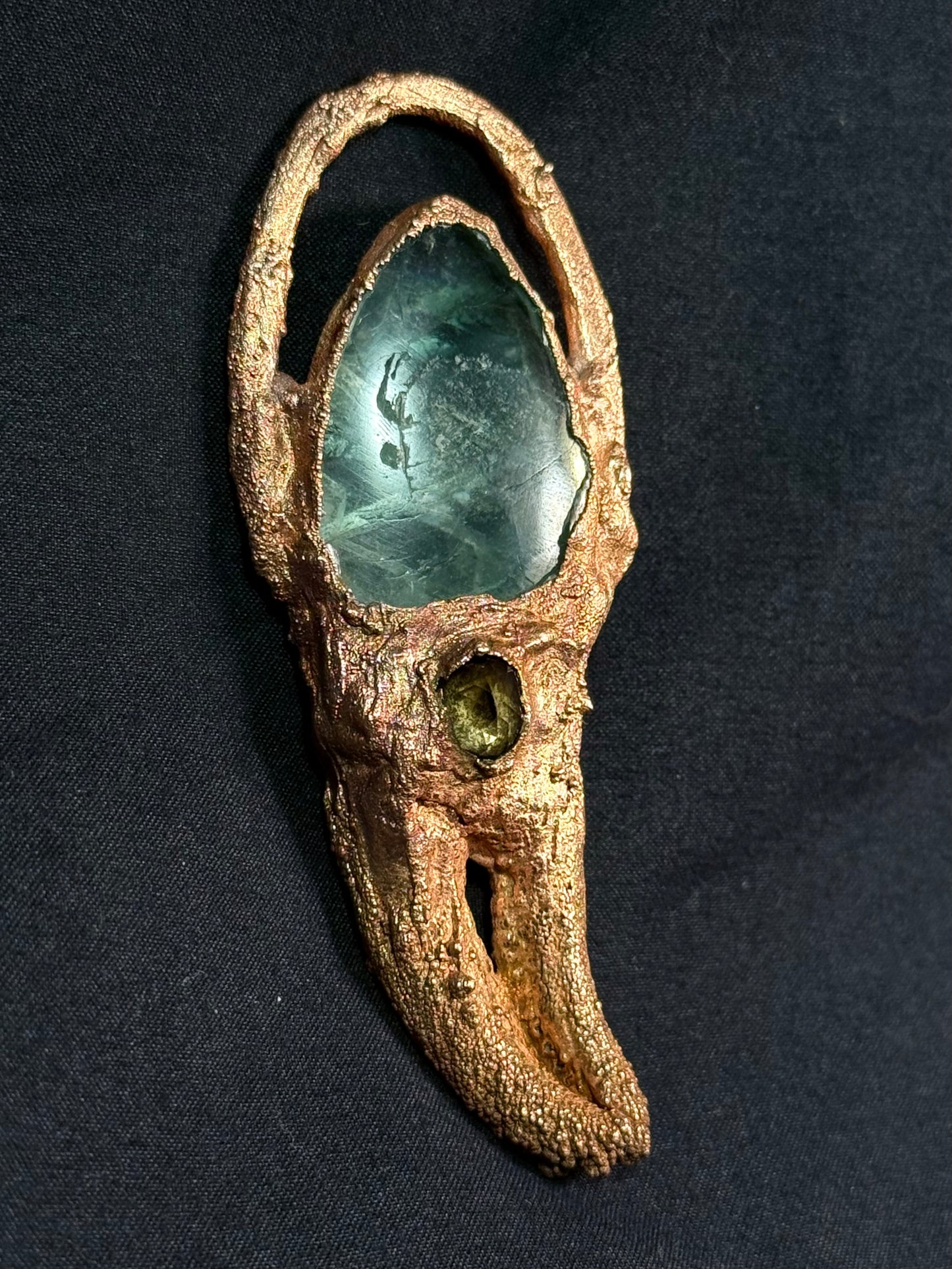 Fluorite crab claw amulet