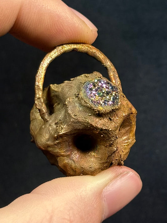 Tessellated rose quartz amulet