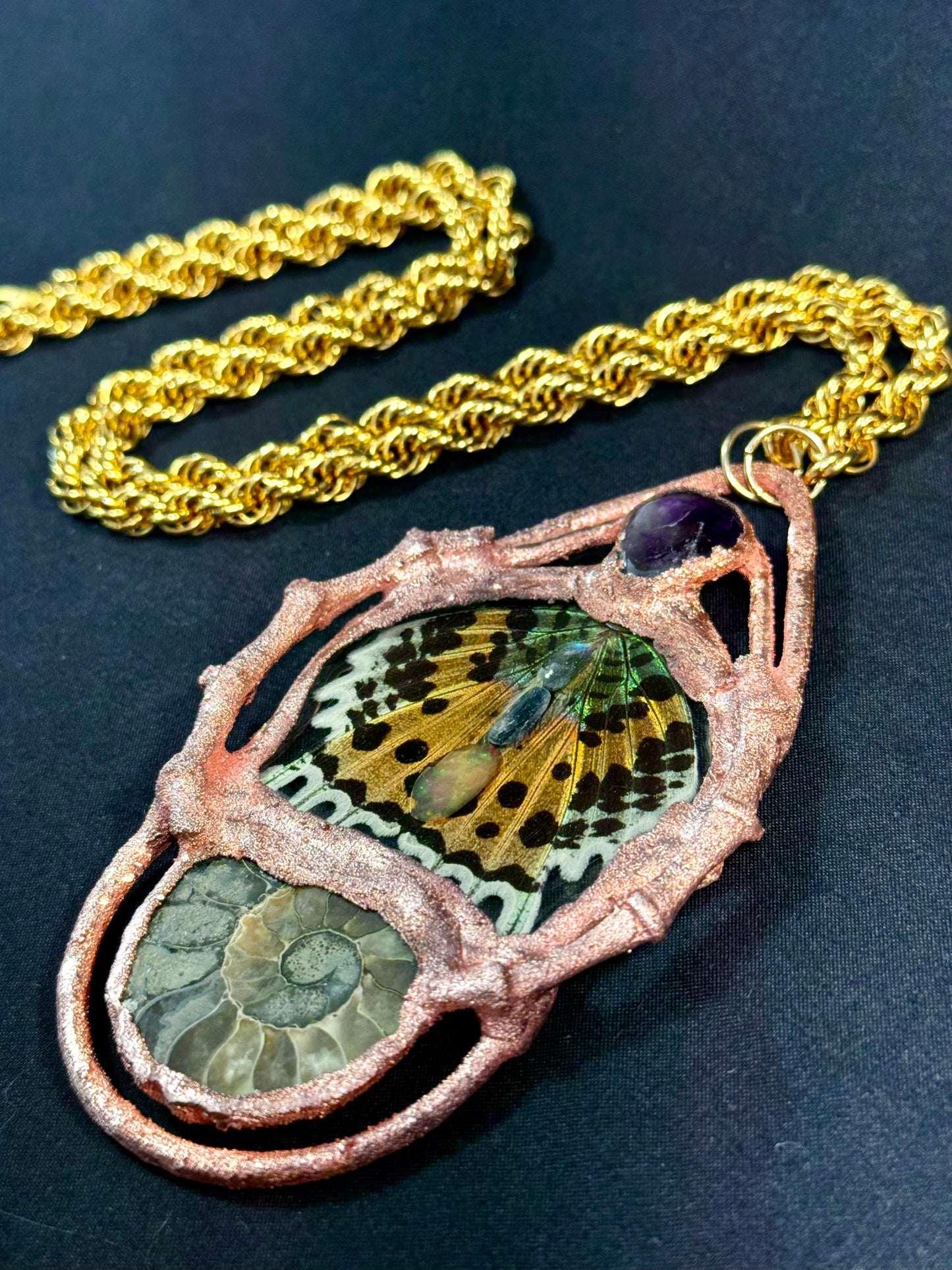 Amethyst sunset moth amulet