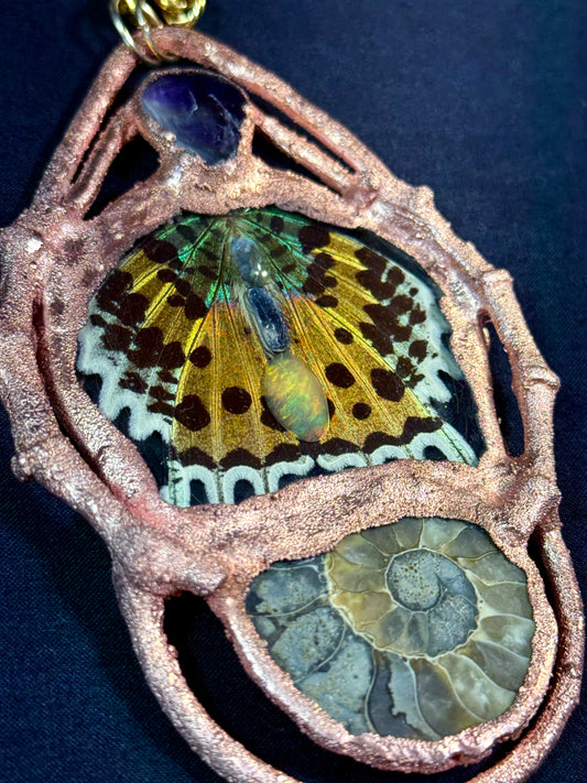 Amethyst sunset moth amulet