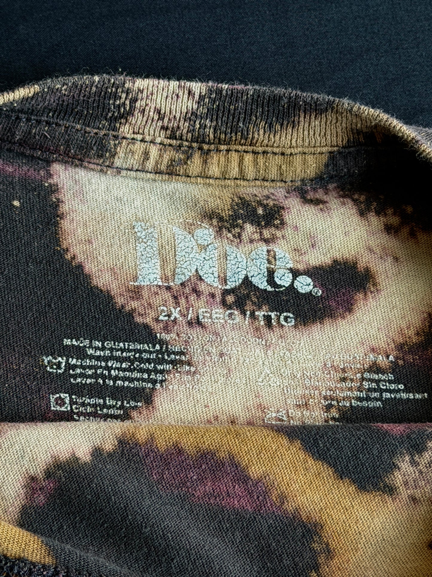 Three headed snail bleach dyed t-shirt