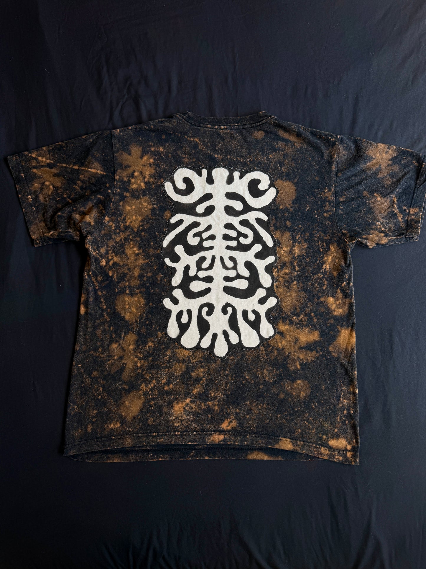 Abstract butterfly + shape bleach dyed t-shirt