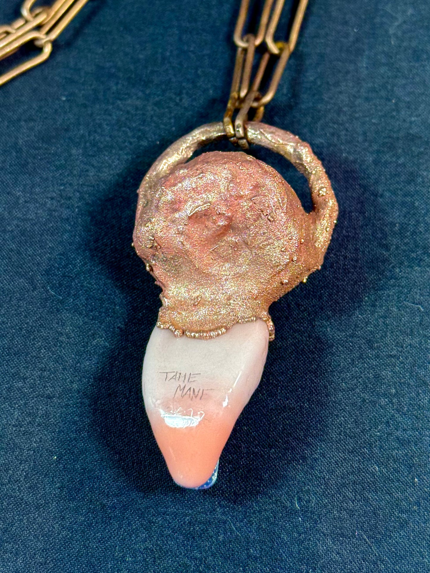 Glass tongue and eye amulet