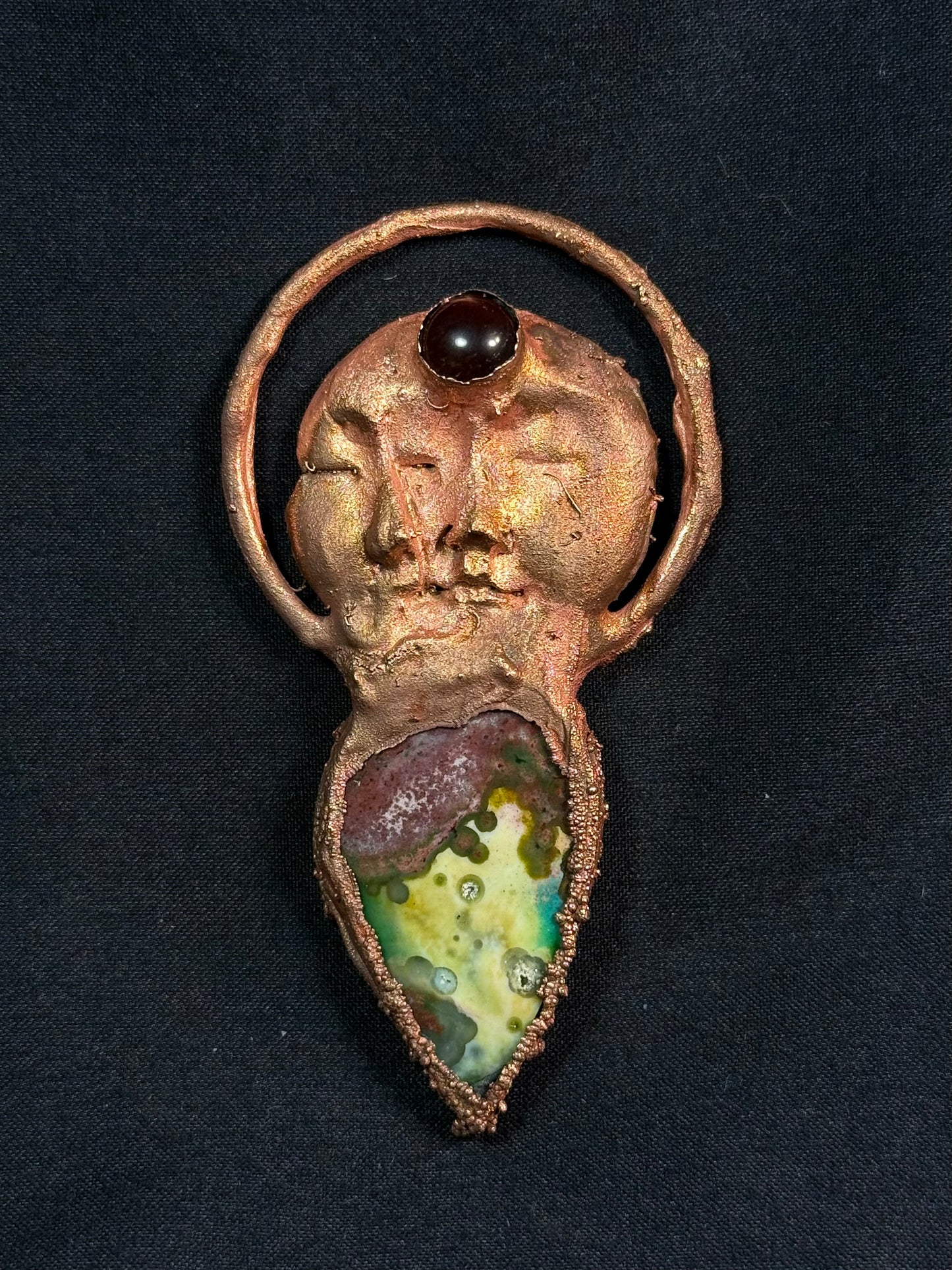 The sun and moon agate amulet