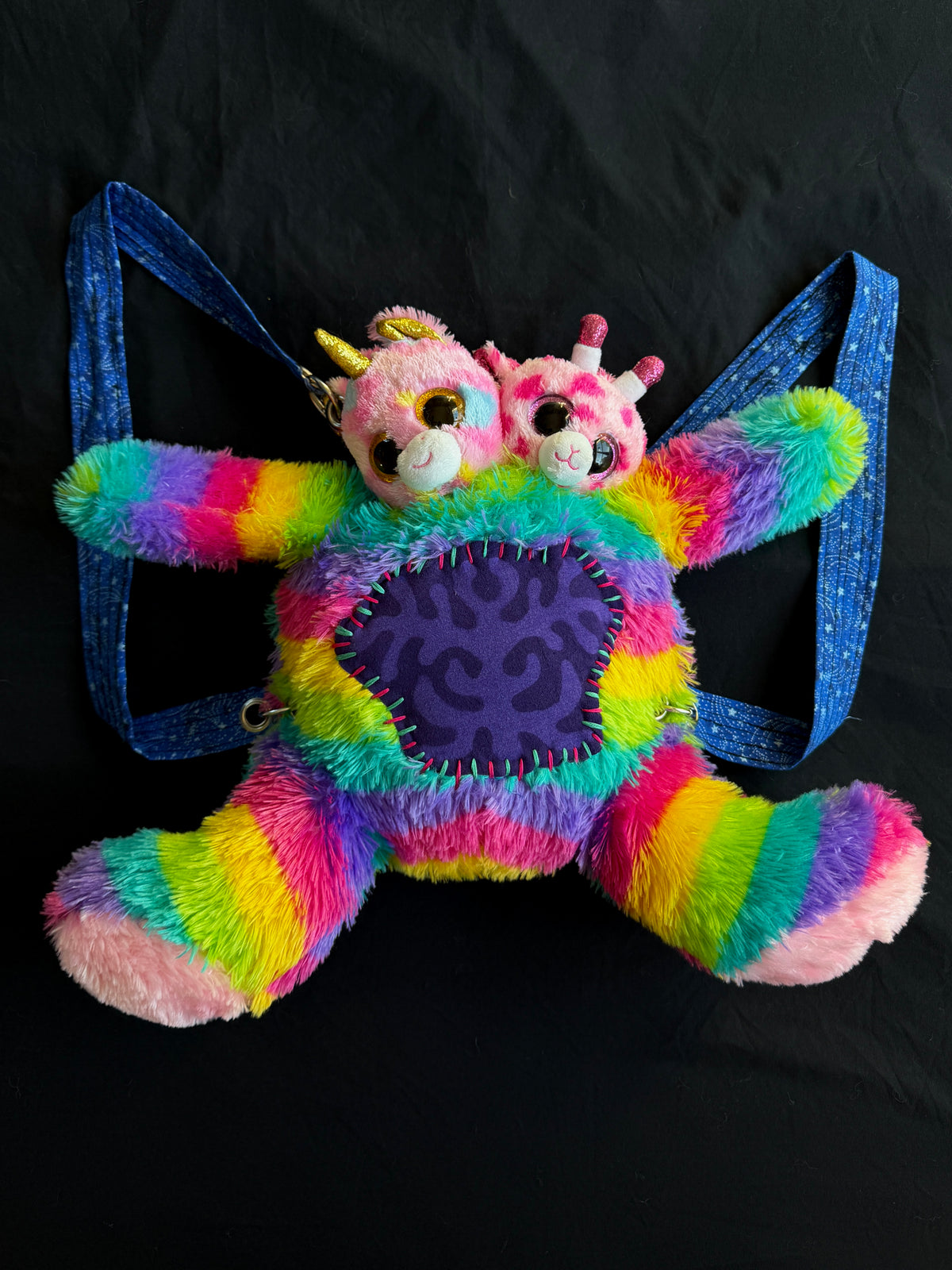 Two headed rainbow explosion hybrid back pack