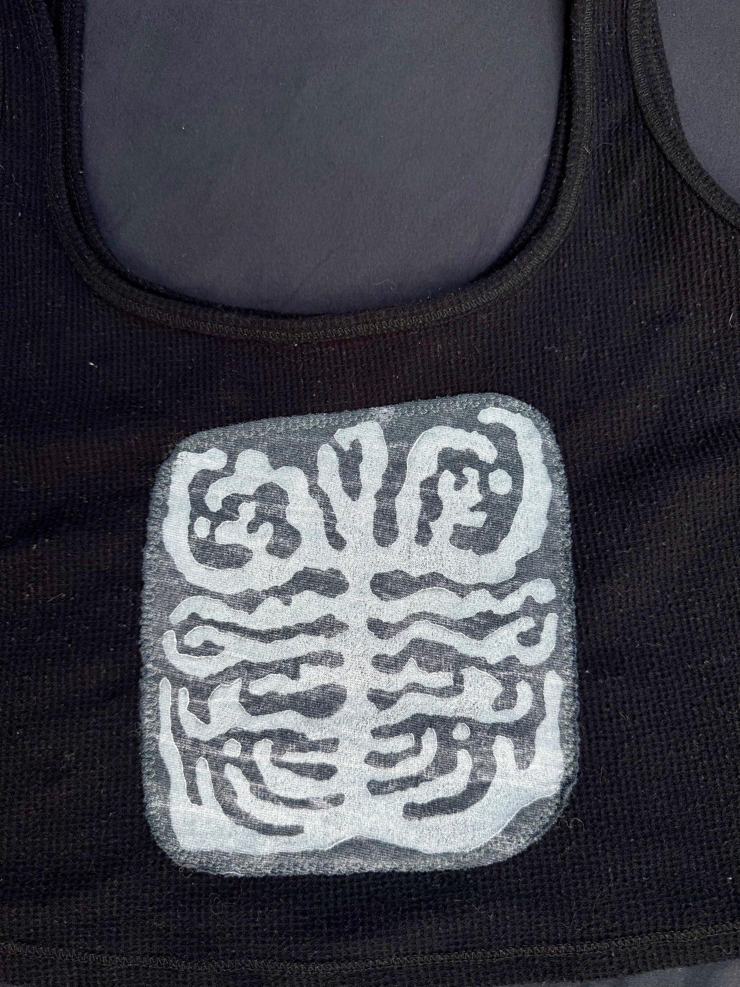 Shape patch tank top