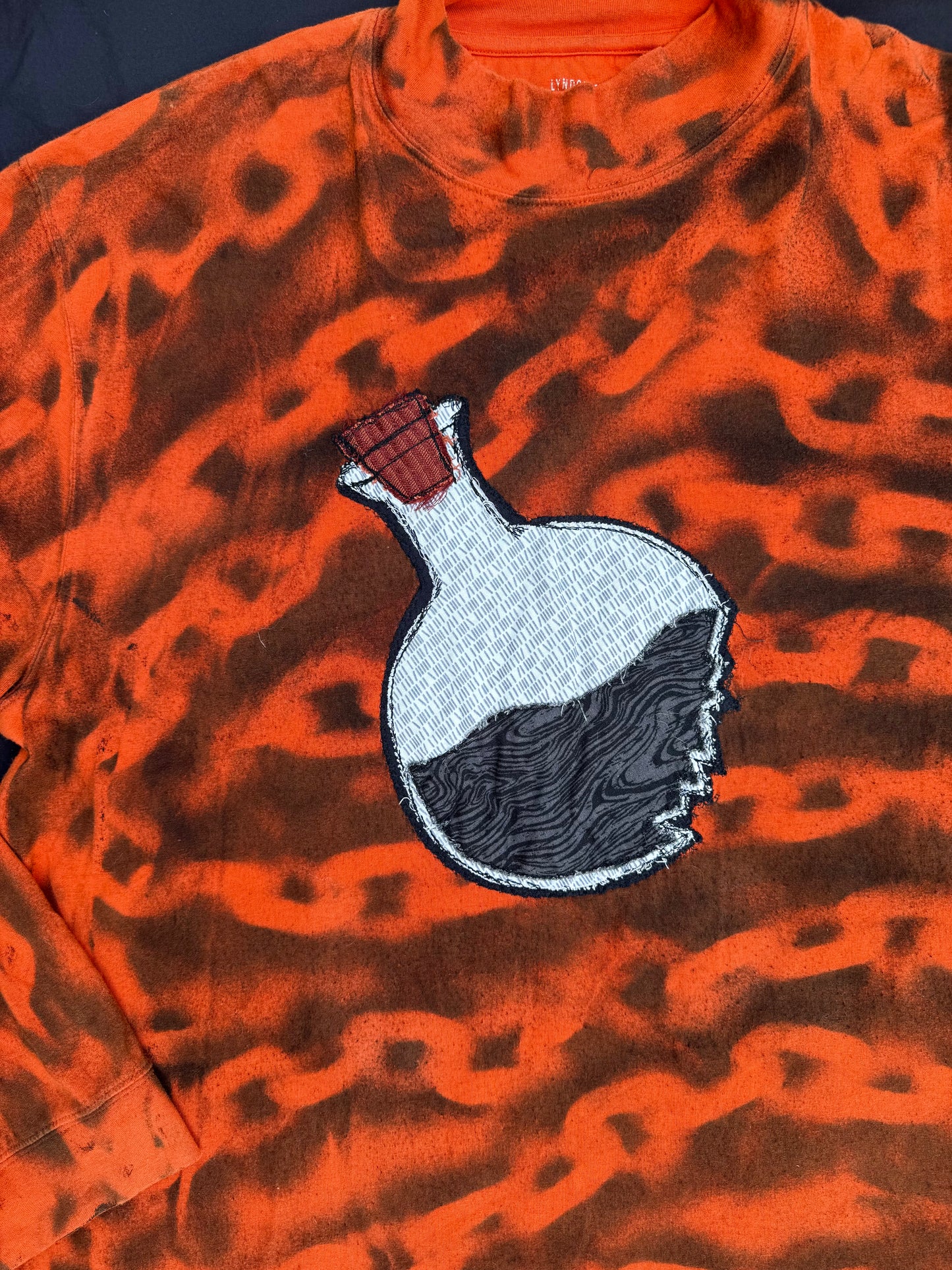 Chemical X chain spray painted shirt