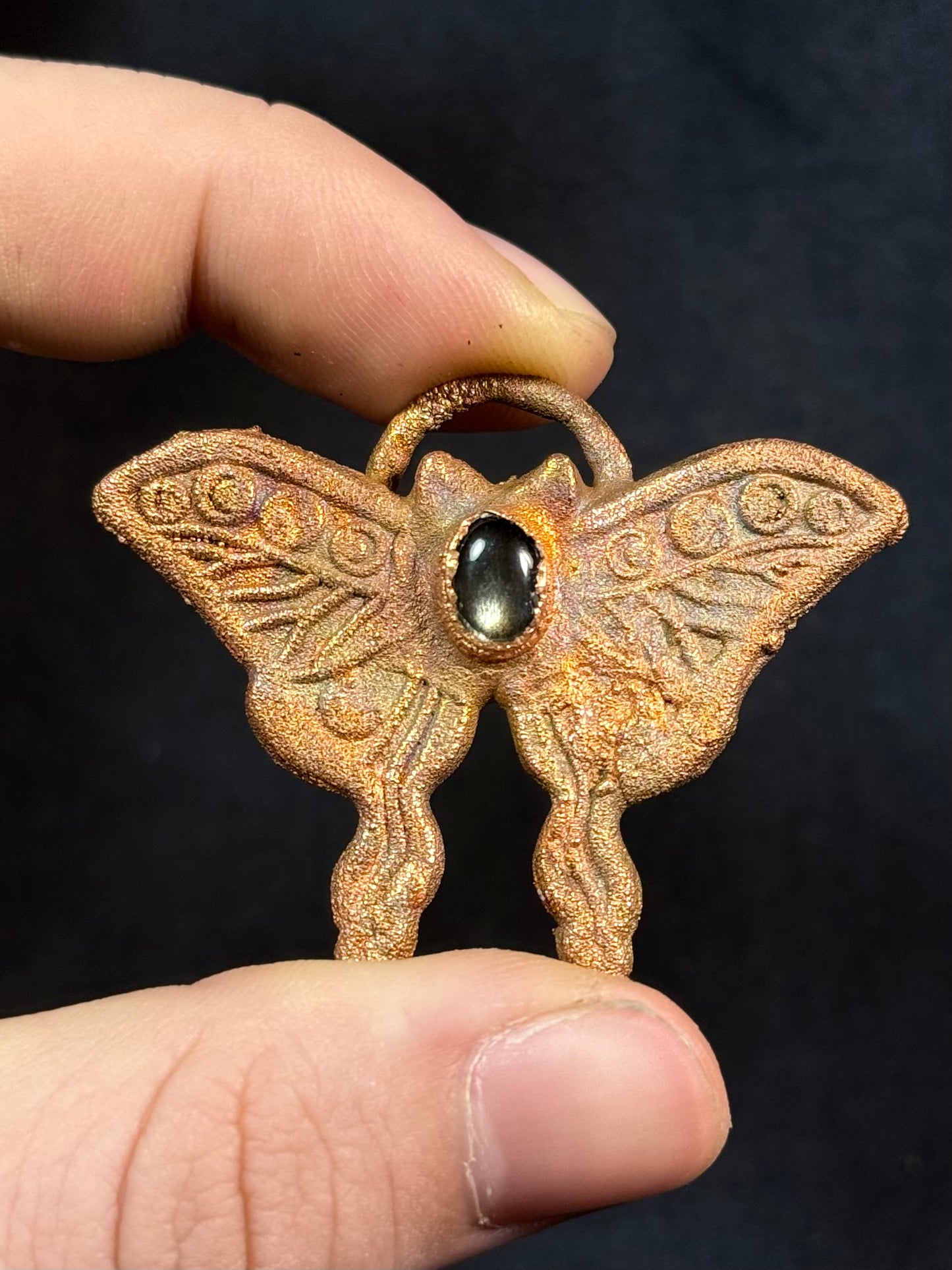 Obsidian butterfly amulet