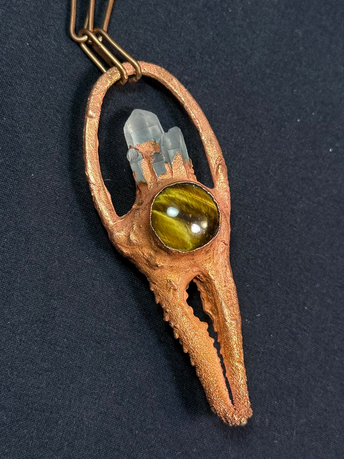 Crab claw amulet
