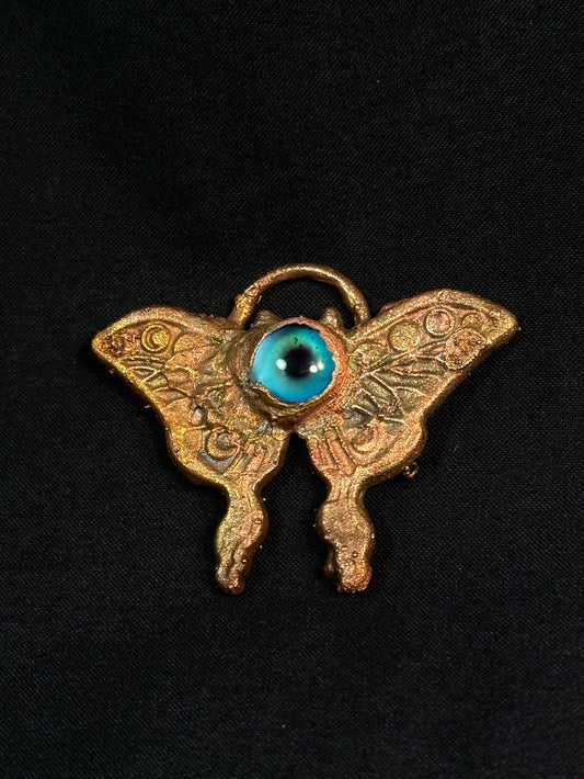 Eye butterfly amulet