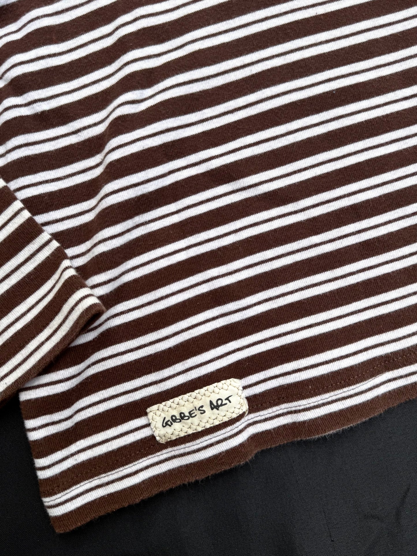 Shape patch striped turtle neck