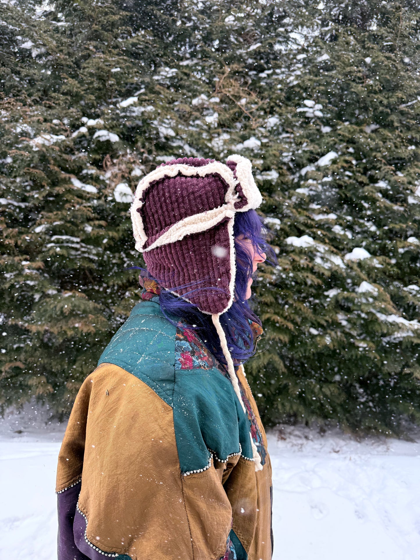 Purple corduroy ushanka with white fluffy lining