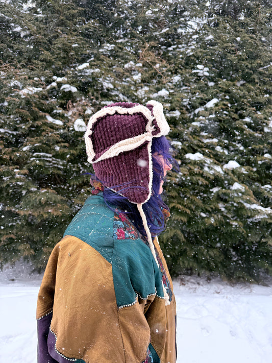 Purple corduroy ushanka with white fluffy lining