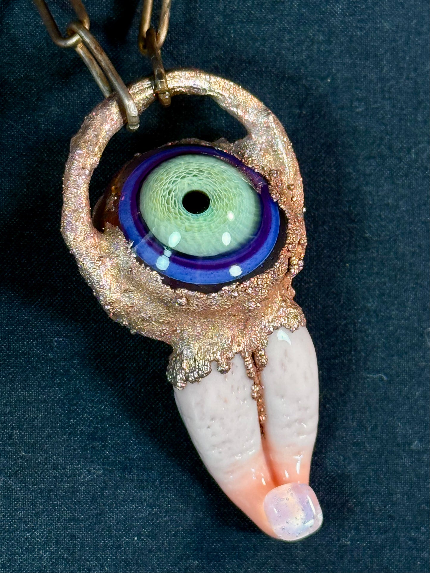 Glass tongue and eye amulet