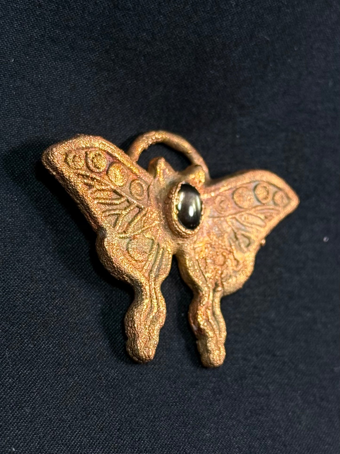 Obsidian butterfly amulet