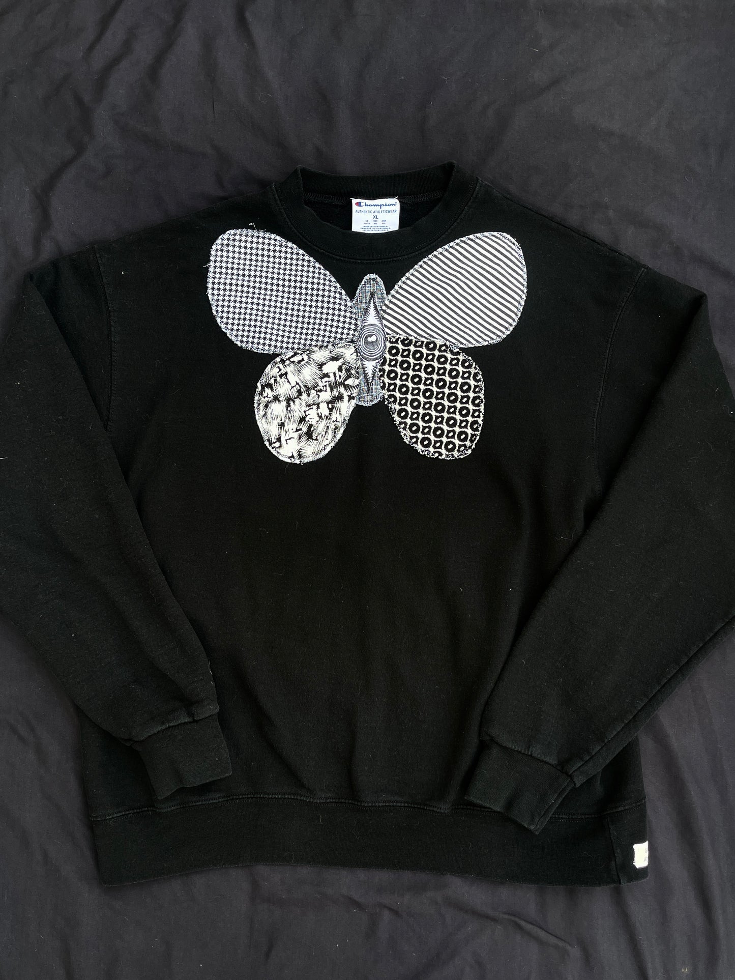 B&W butterfly + spine sweatshirt