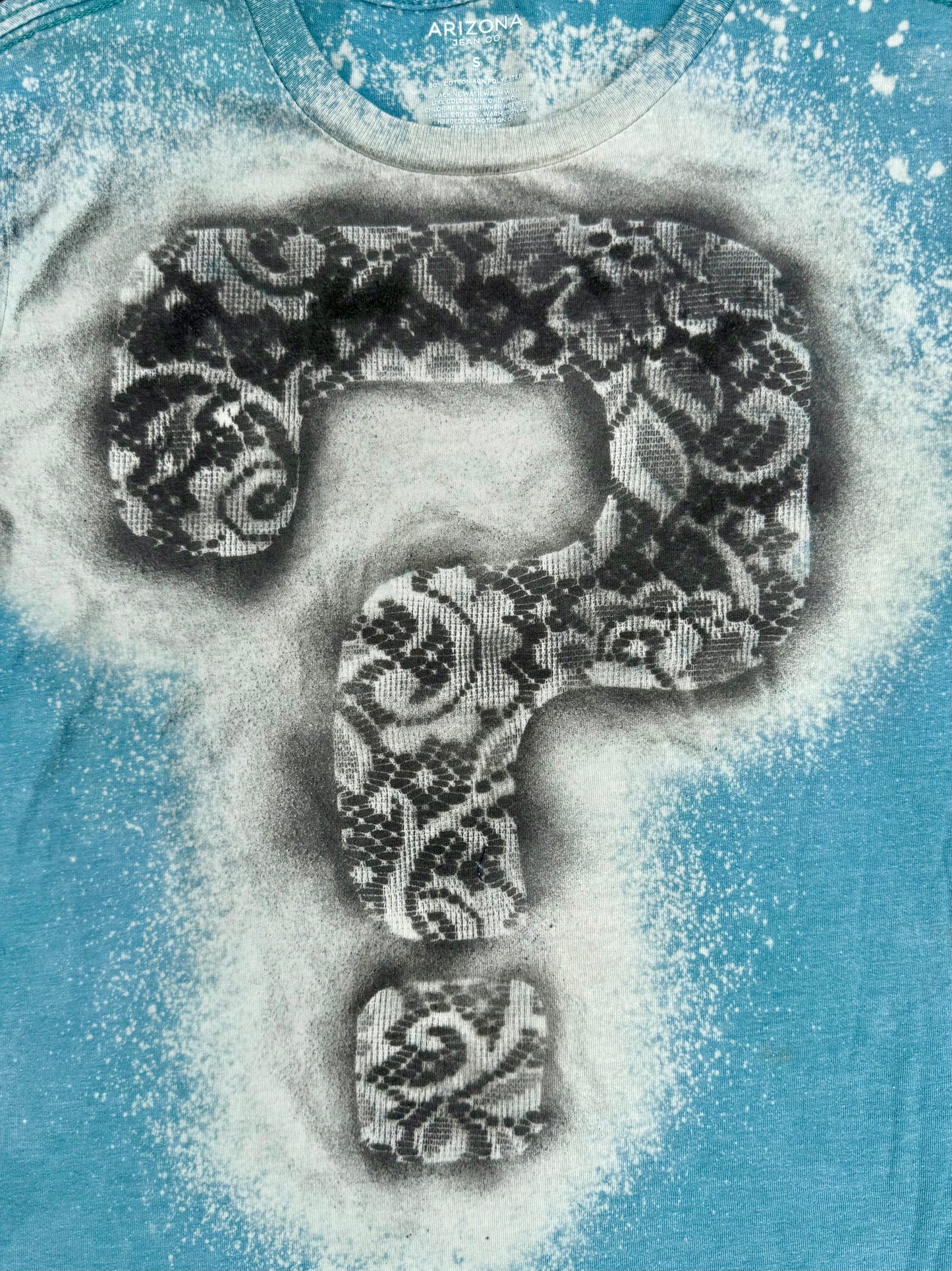 Tipper bleach dyed and spray painted t-shirt