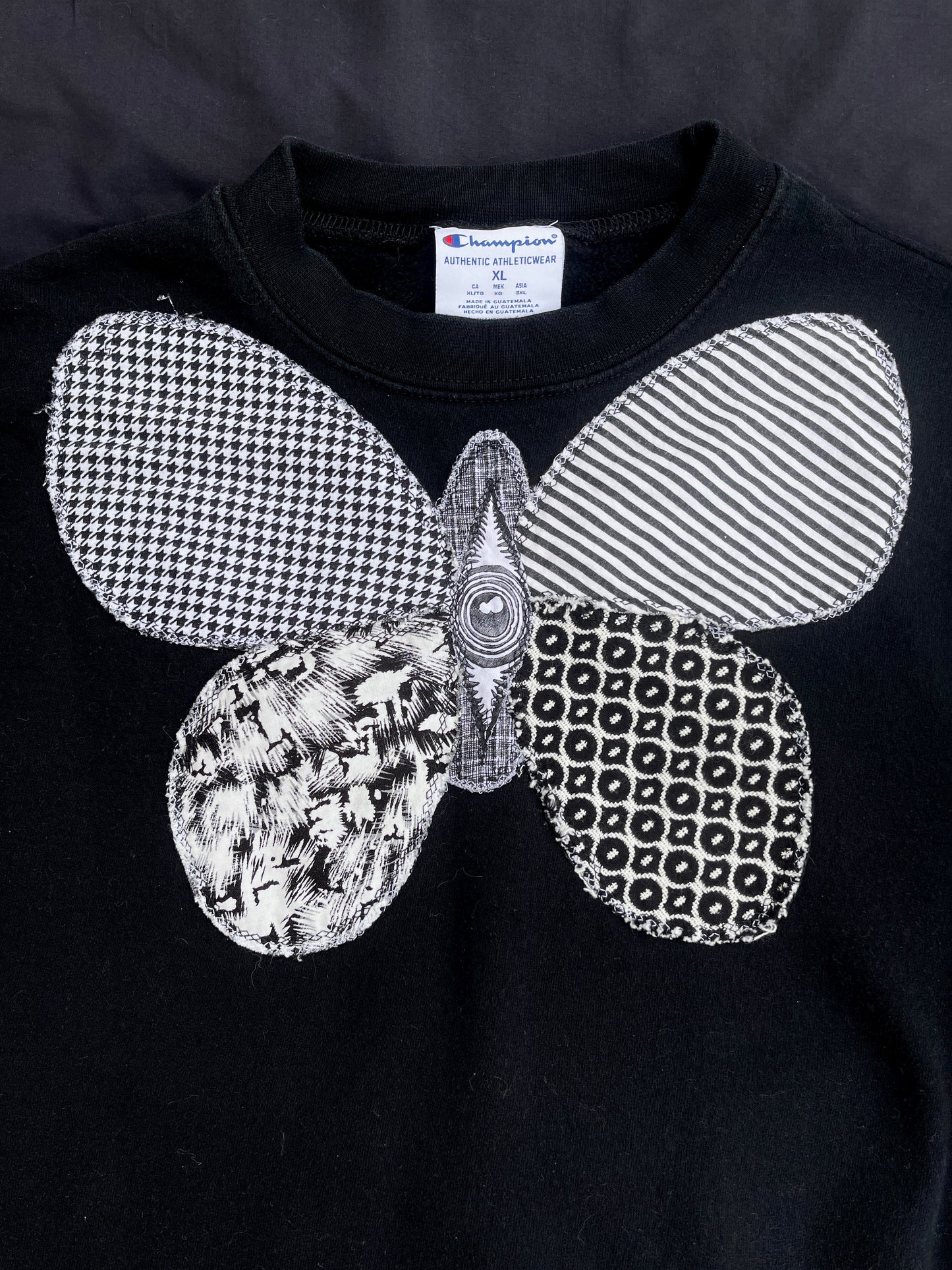 B&W butterfly + spine sweatshirt