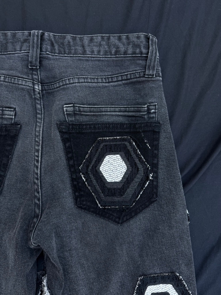 Black and white geometric denim pants with corduroy flair