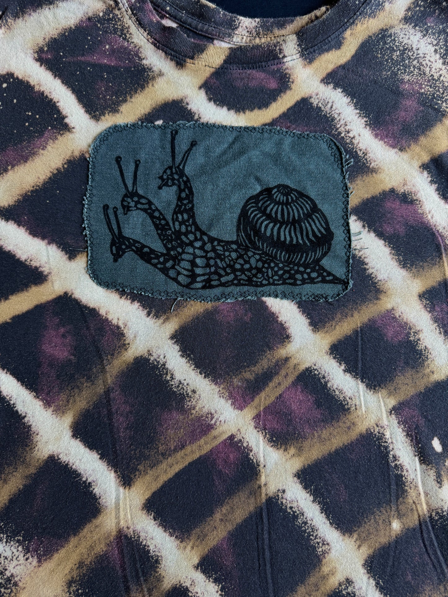 Three headed snail bleach dyed t-shirt