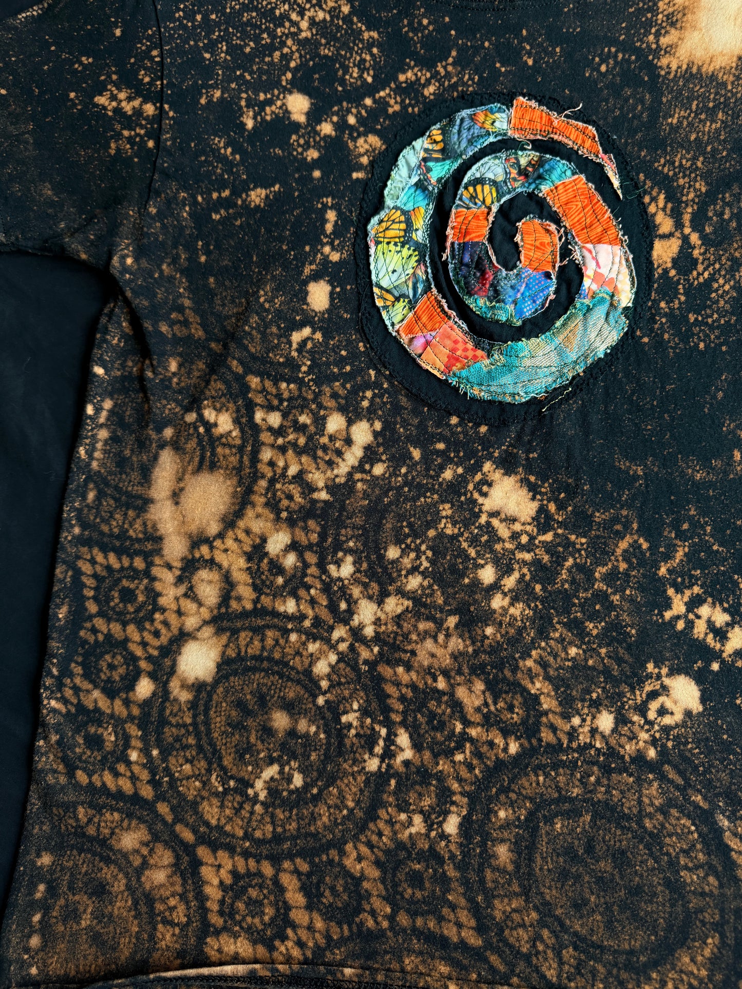 Spiral patch bleach dyed t-shirt